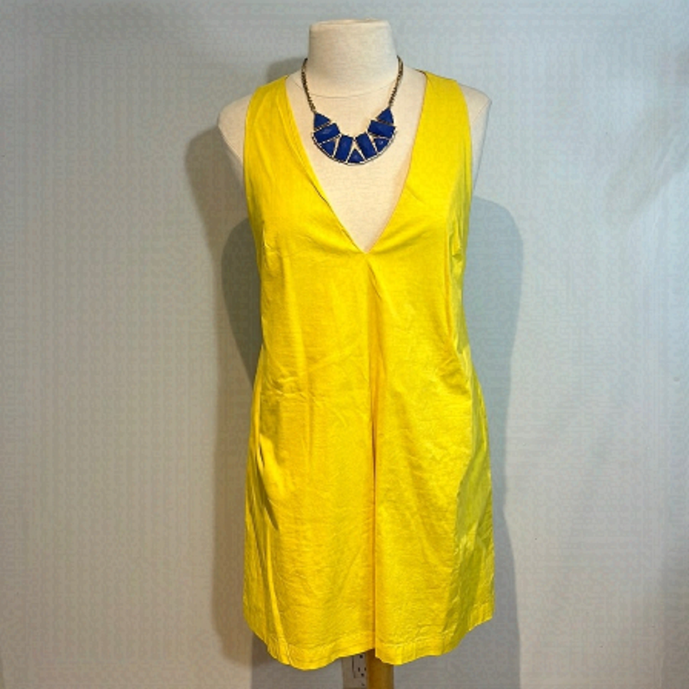 Free People yellow “V” neck mini dress size M/L